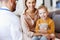 Happy child boy patient with his mother at reception of a friendly pediatrician family doctor family pediatrician