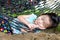 Happy child enjoying and relaxing in hammock, sweet dream and sm