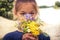 Happy child girl present flower bouquet concept happy childhood