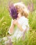 Happy child holding lavender