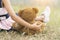 Happy Child hug teddy bear in green park playground. Teddy bear best friend for little kids cute girl. Autism happy funny playing