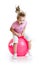 Happy child jumping on bouncing ball