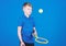 Happy child play tennis with skills. Gym workout of teen boy. Tennis player with racket and ball. Little boy has skills