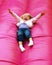 Happy child playing on slide