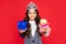 happy child in queen crown. princess in tiara hold box. kid with present. teen girl