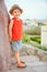 Happy child walking on stairs on nature background