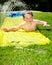 Happy child on water slide