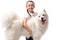 Happy child with white dog. Portrait girl with pet. Smilyng Samoyed Laika dog.