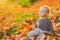 Happy childhood. Autumn dream. Kid dreams on autumn nature. Childhood dream concept. Daydreamer child. Dreams and