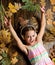 Happy childhood. Kid girl wooden background listen music headphones. Child listen music relaxing top view. Autumn melody
