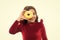 Happy childhood and sweet treats. Breaking diet concept. Girl hold sweet donut white background. Child hungry for sweet