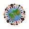 Happy children of different races and colors holding hands and standing on the globe