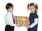 Happy children hold a gift box