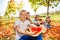 Happy children holding watermelon and eating