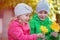 Happy children playing in autumn park