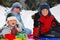 Happy children playing in snow