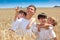 Happy children in wheat field