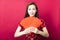 Happy chinese new year.young woman with red envelope