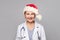 Happy Christmas woman doctor Santa on white background