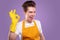 Happy cleaner showing OK gesture on purple background