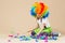 Happy clown boy with large colorful wig. Let`s party! Funny kid