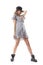 Happy comfortable confident stylish young woman holding cap in flounce summer dotted dress and boots