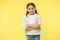 Happy confident child keep arms crossed on chest. Cheerful and confident. Little girl with cute smile. Casual look and