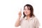 happy, confident middle aged woman pointing up one finger