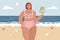 Happy confident plus size woman in a swimsuit on a beach