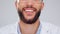 Happy, confident and smiling man closeup of a scientist and his teeth. Mouth of a young male doctor with a beard and big