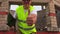 Happy construction worker shows thumb up