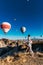 Happy couple in Cappadocia. The man proposed to the girl. Honeymoon in Cappadocia. Couple at the balloon festival. Couple travels