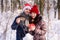 Happy couple celebrite in winter forest