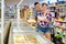 Happy couple choosing frozen convenience food in supermarket