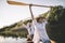 Happy couple enjoy canoe ride on the lake