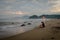 Happy couple enjoying their moments on Karang Hawu Beach, West Java, Indonesia