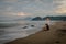 Happy couple enjoying their moments on Karang Hawu Beach, West Java, Indonesia