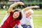 Happy Couple Exercising In Park