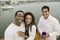 Happy Couple With Friend On Yacht