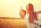 Happy couple having fun outdoors on wheat field