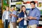 Happy Couple Holding Tool Set In Hardware Store