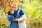 Happy couple in love ai autumn time. Autumn fashion. Dating and having fun together. Autumn mood, lifestyle. Young couple on a