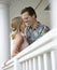 Happy Couple on Porch of Home