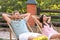 Happy couple relaxing in deckchairs