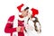 Happy couple with santa hats holding mug and kissing