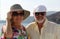 Happy couple of seniors on the tourist boat  smiling, enjoying trip on the Mediterranian sea