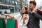 Happy couple with shopping bags. Sale, travel, love consumerism and people concept.