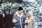 Happy couple spending good day outdoor in snowy winter