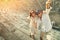 Happy couple take a selfie photo on the steps of antique ruins