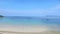 Happy couple together on the beach. Young couple enjoying each other on a beach. a portrait of attractive couple having